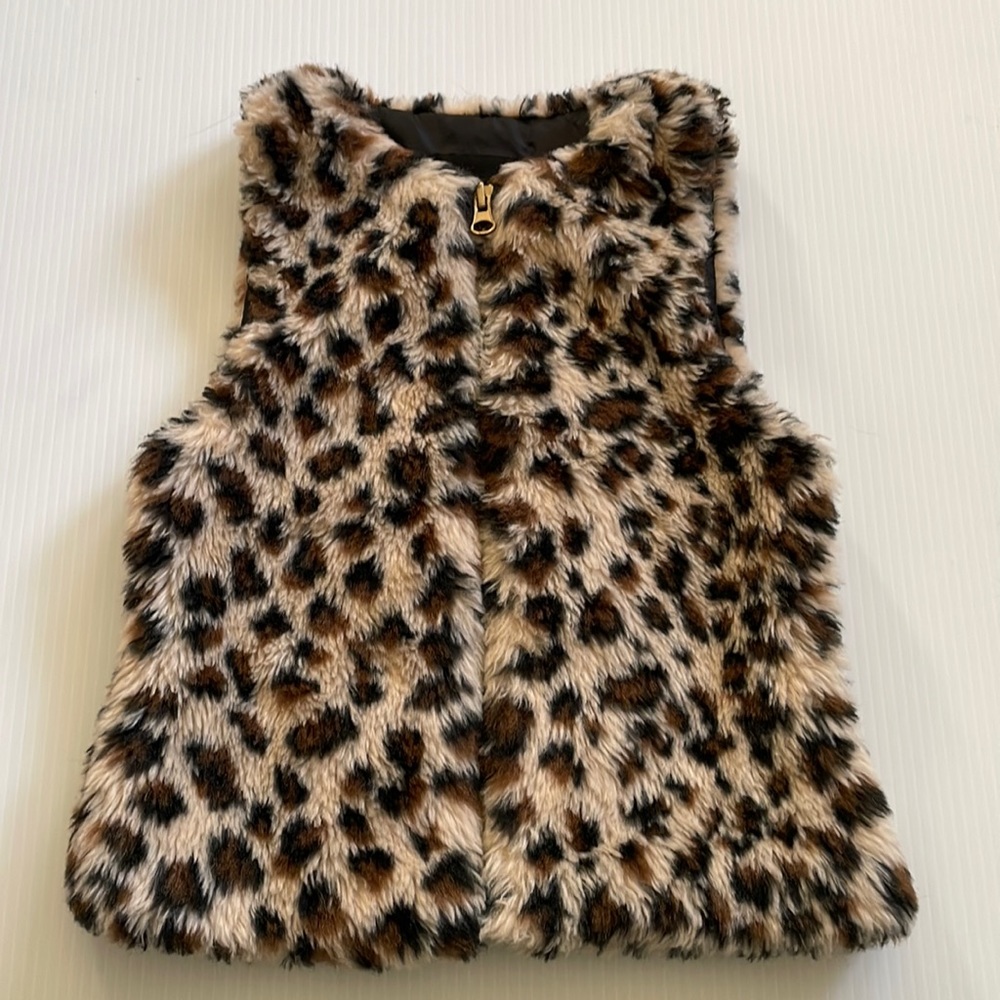 Me Jane black, brown & tan faux fur vest. Girl’s size 7